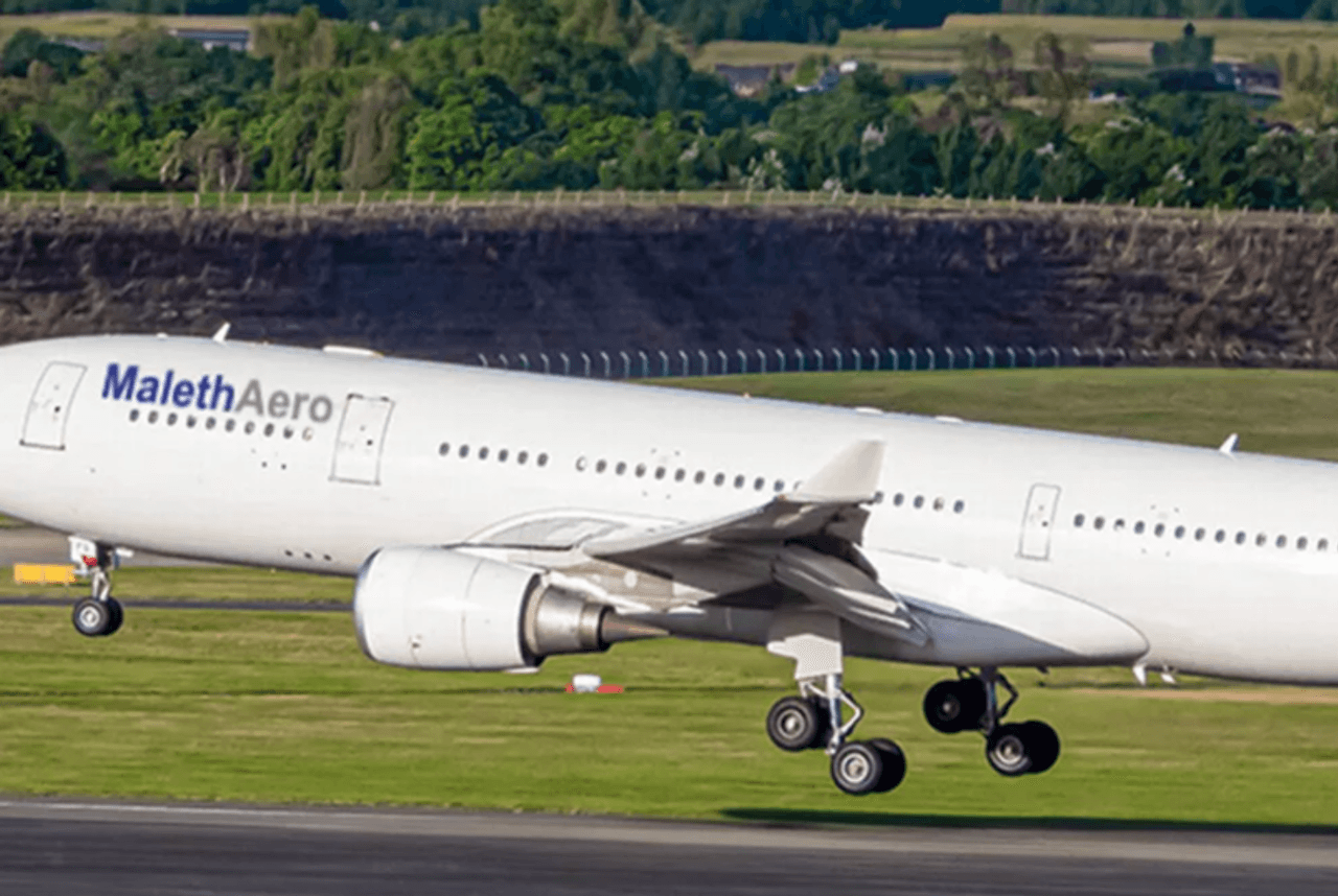 UK-Bound Flight Diverts to Bermuda with Injured Passengers on Christmas Eve: Ministry of National Security Investigates