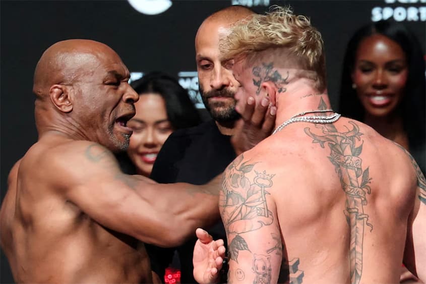 Mike Tyson Confronts Jake Paul in Fiery Weigh-In Ahead of Highly Anticipated AT&T Stadium Showdown